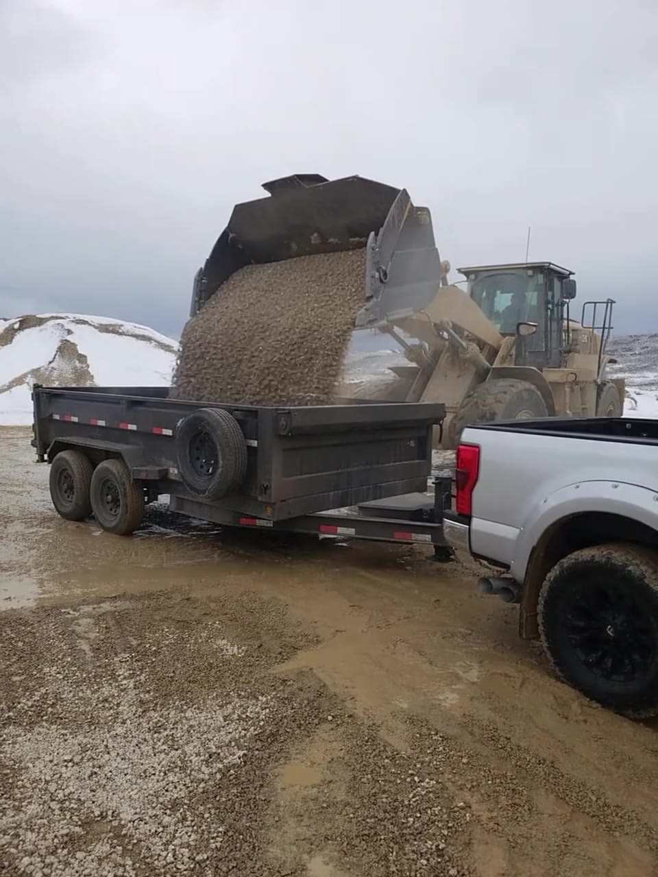 Wasatch Demolition loader hauling gravel on a Wasatch Back construction site